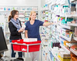 Pharmacist assisting a customer